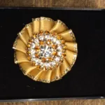 Brosche Roset